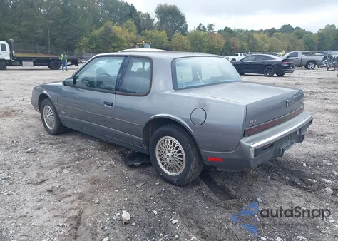 1987 Oldsmobile Toronado Brougham z USA, uszkodzony, nr VIN 1G3EZ1135HU306920
